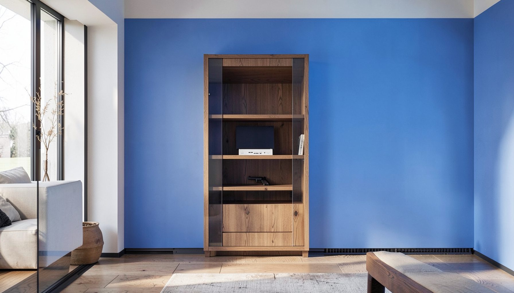 A hidden gun cabinet disguised as a wooden wall shelf with a false front, warm oak finish, in a living room setting
